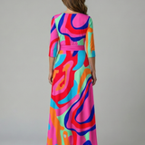 Celeste™ | Vestido Midi Floral con Escote Cruzado y Manga Tres Cuartos